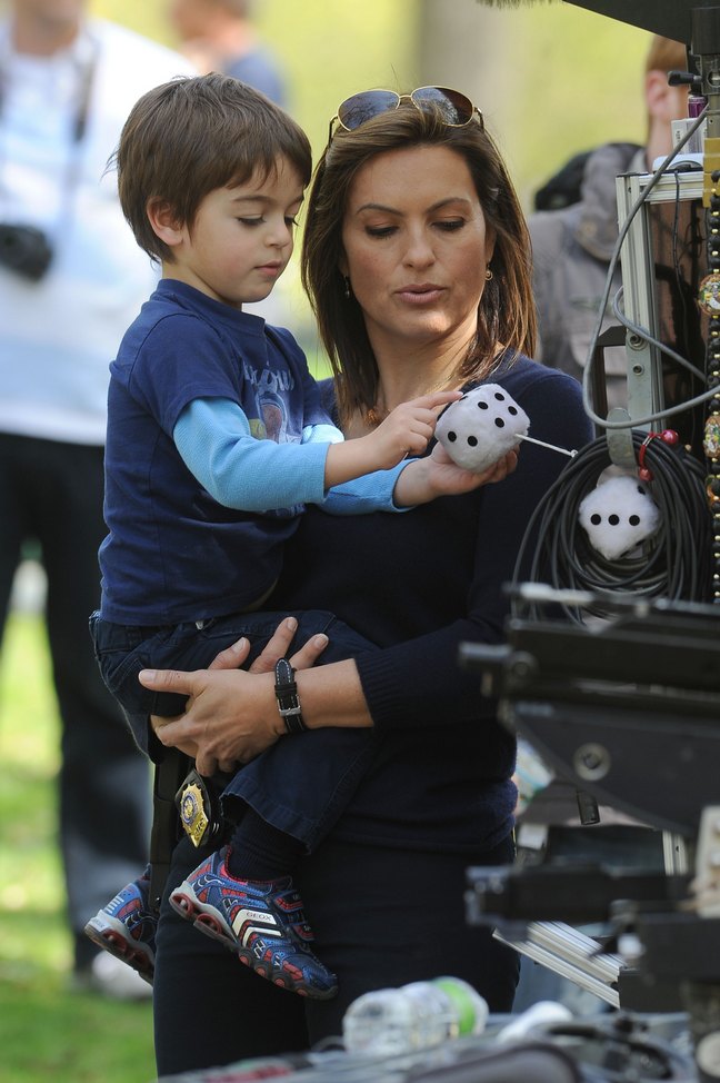 Mariska Hargitay, sunglasses, watch, blue top, navy blue pants